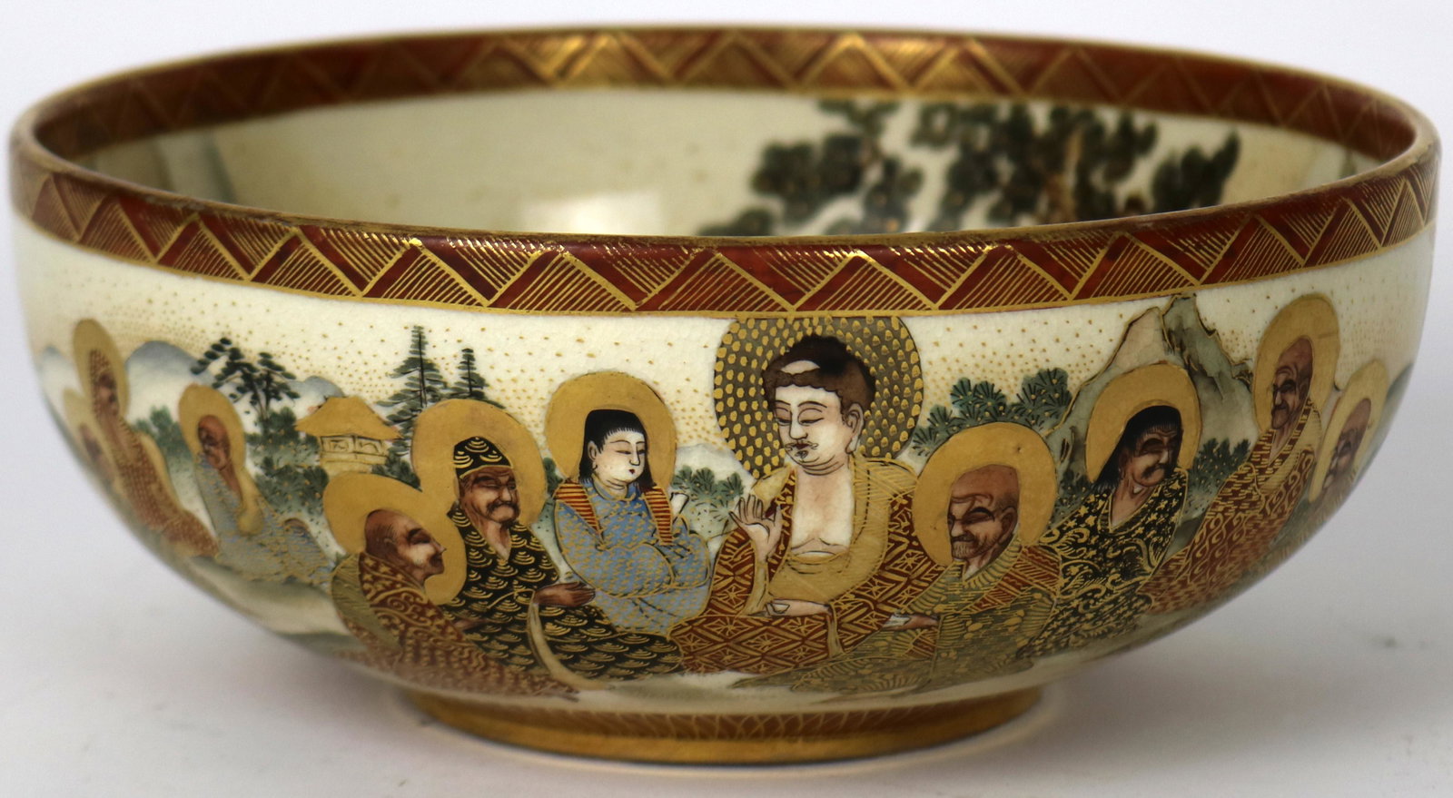 A Japanese Satsuma Immortal Bowl: A Japanese Satsuma Immortal Bowl, the interior painted with numerous immortals participating ceremonial meditation, the outside with a continuous scene of immortals gathering together with their atten
