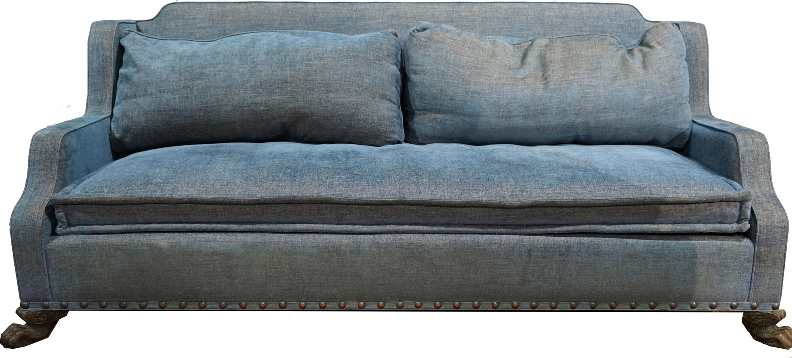 A Classical style custom sofa: A Classical style custom sofa, having a rectangular profile with light blue upholstery, above brass nail head trim, and rising on paw feet, 46"h x 96.5"w x 48"d