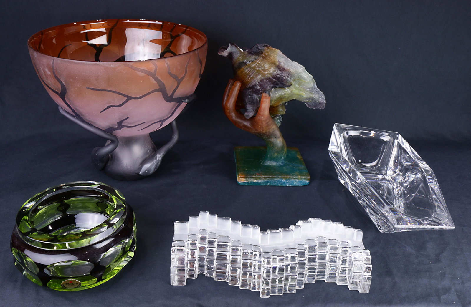 An Art glass group: (lot of 5) Art glass group, consisting of a Moser green to clear glass bowl, a Daum, France geometric form dish, and a Lalique abstract skyscraper form sculpture, each marked on underside, largest: 11