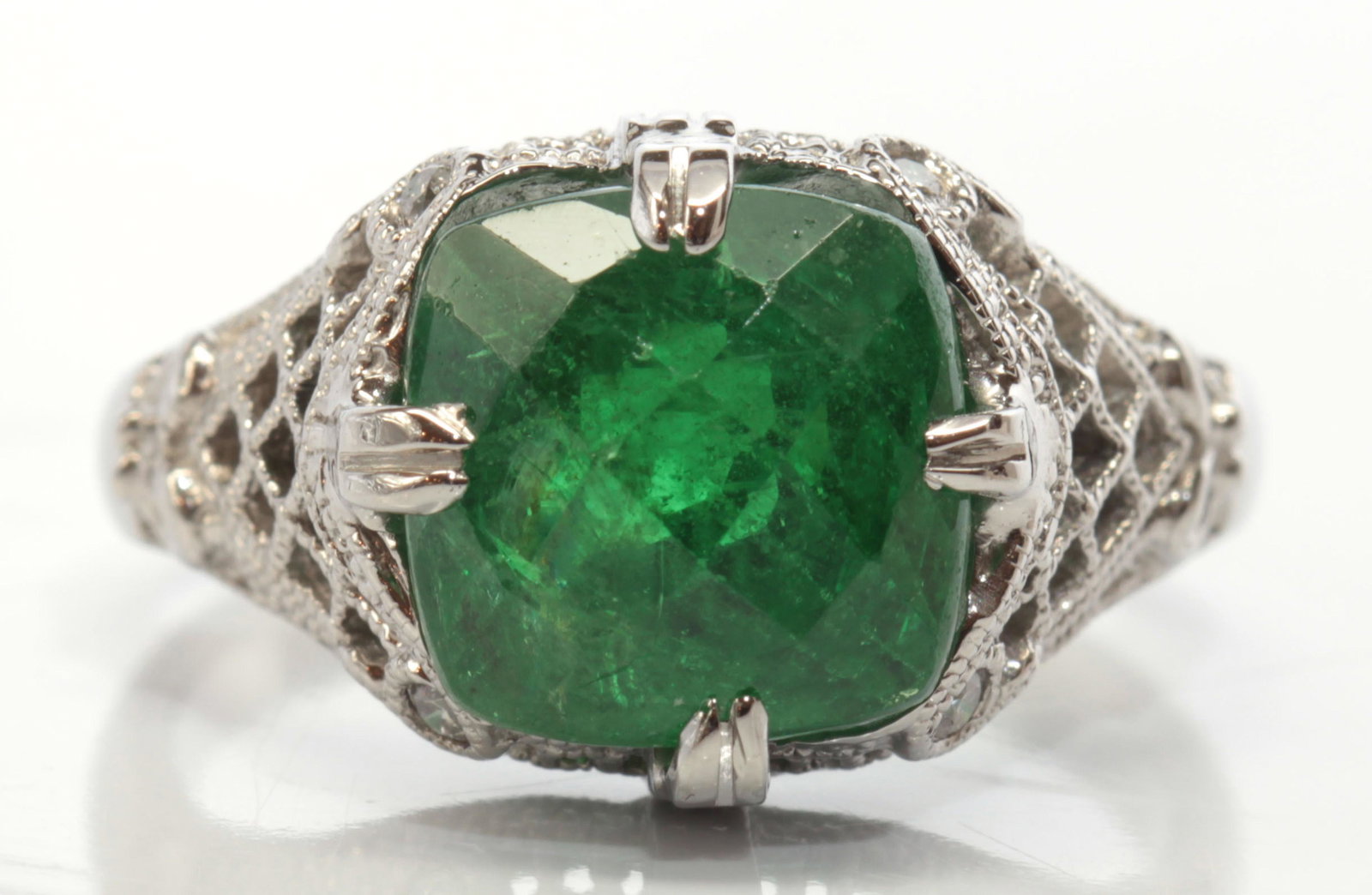 Tsavorite garnet, diamond, 14k white gold ring: Tsavorite garnet, diamond, 14k white gold ringCentering (1) faceted-topped square-cut tsavorite garnet, weighing approximately *6.20 cts., accented by (4) full-cut diamond, weighing a total of approxi
