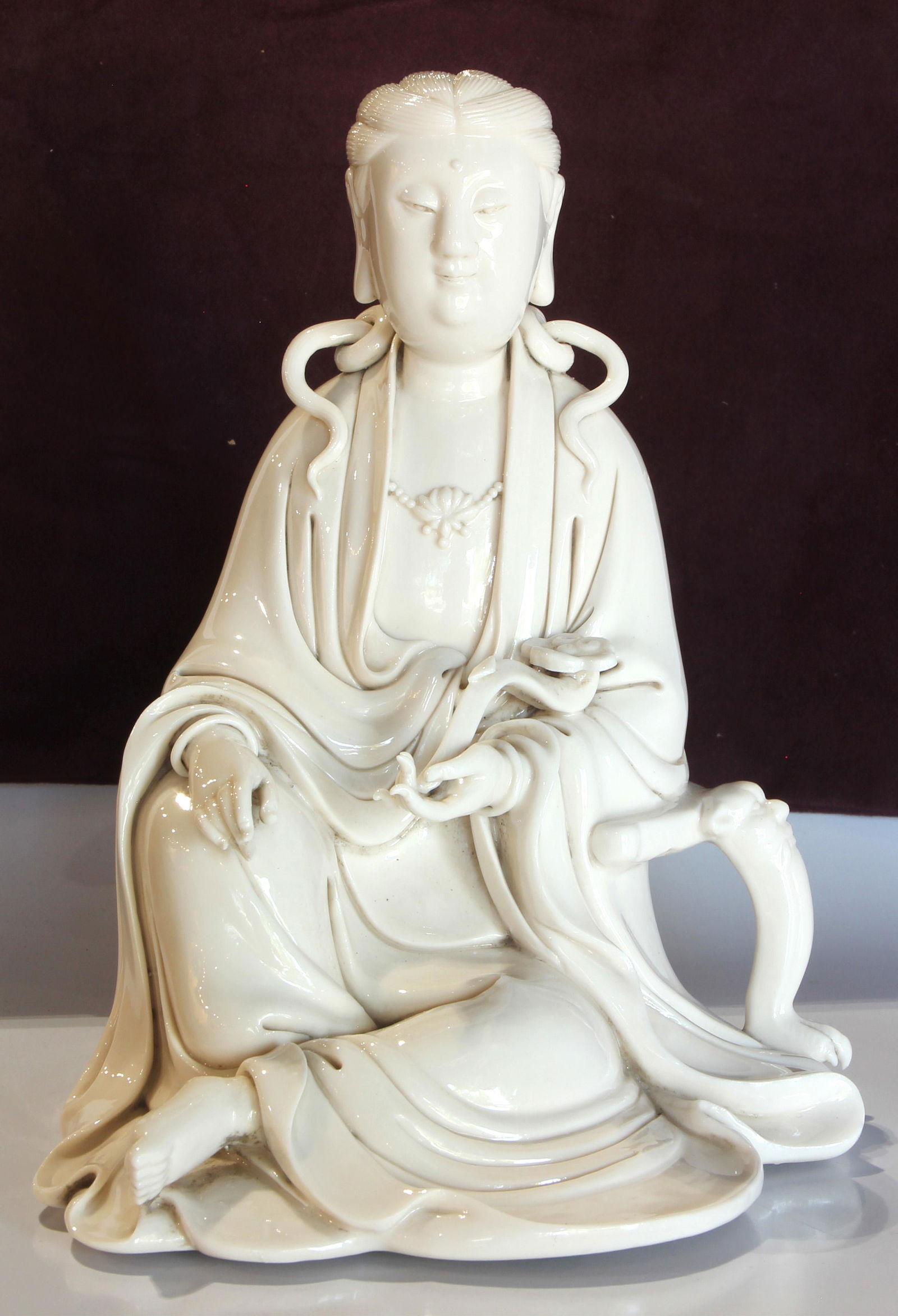 Chinese blanc de chine seated figure of Guanyin (1 of 3)