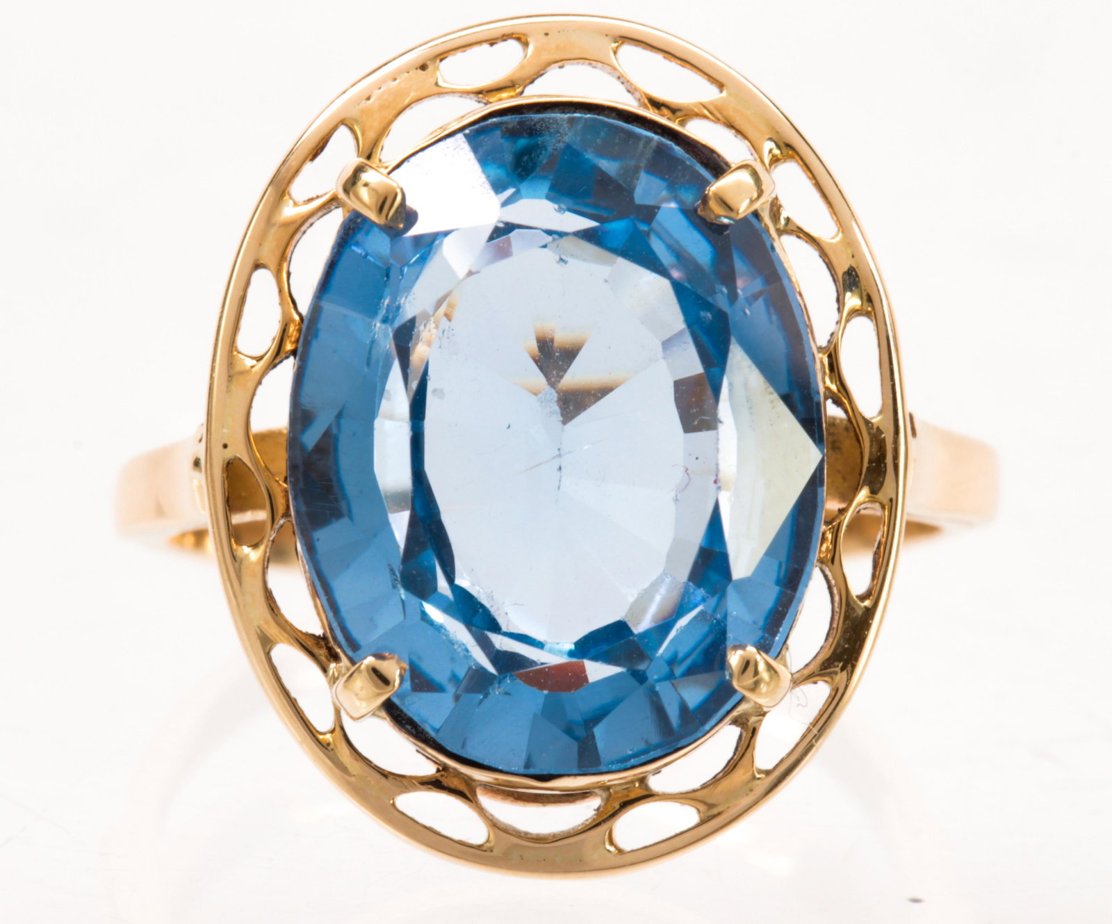 Synthetic spinel, 14k yellow gold ring: Synthetic spinel, 14k yellow gold ring Featuring (1) oval-cut synthetic spinel, set in a 14k yellow gold mounting, size 7, gross weight 5.29 grams