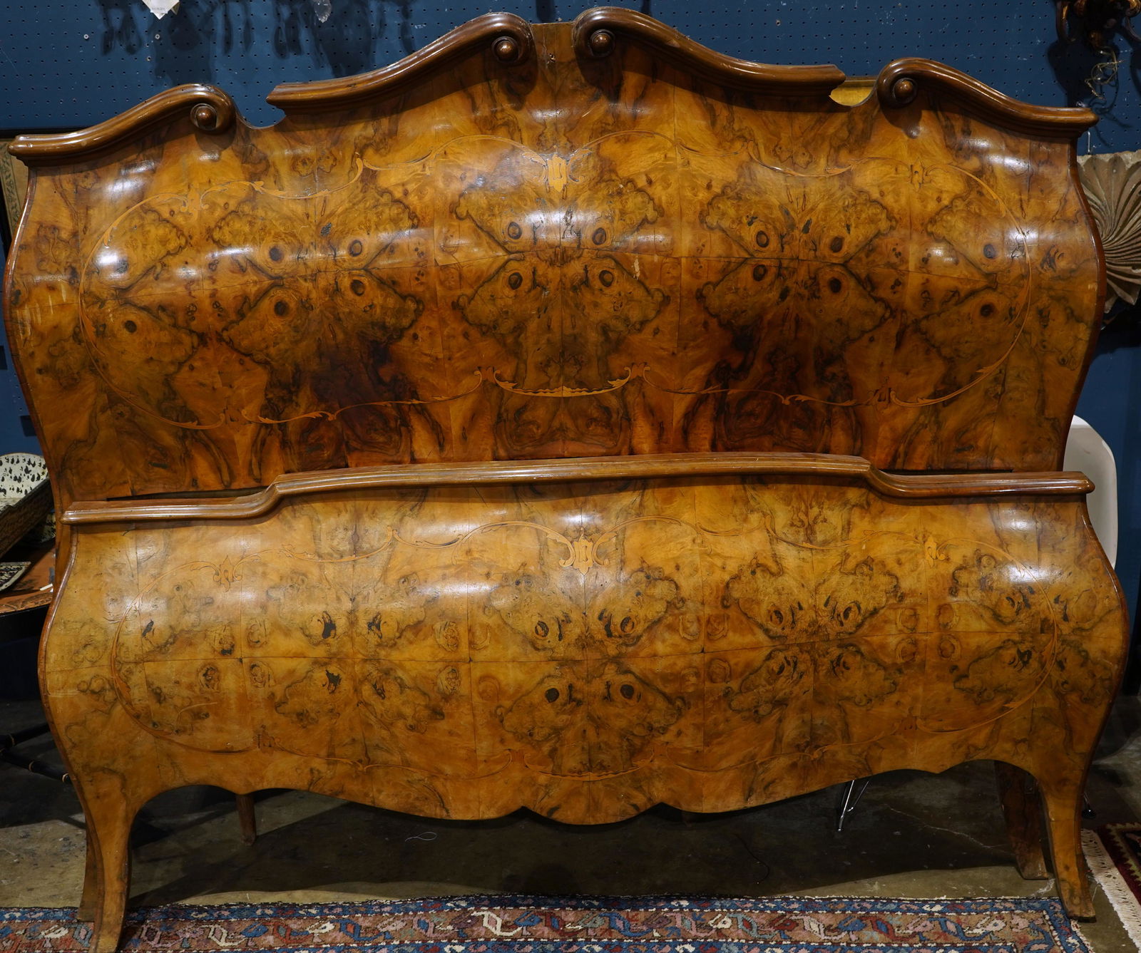 A burlwood bombe form bed in the Rococo taste: A burlwood bombe form bed in the Rococo taste, headboard 59"h x 67"w