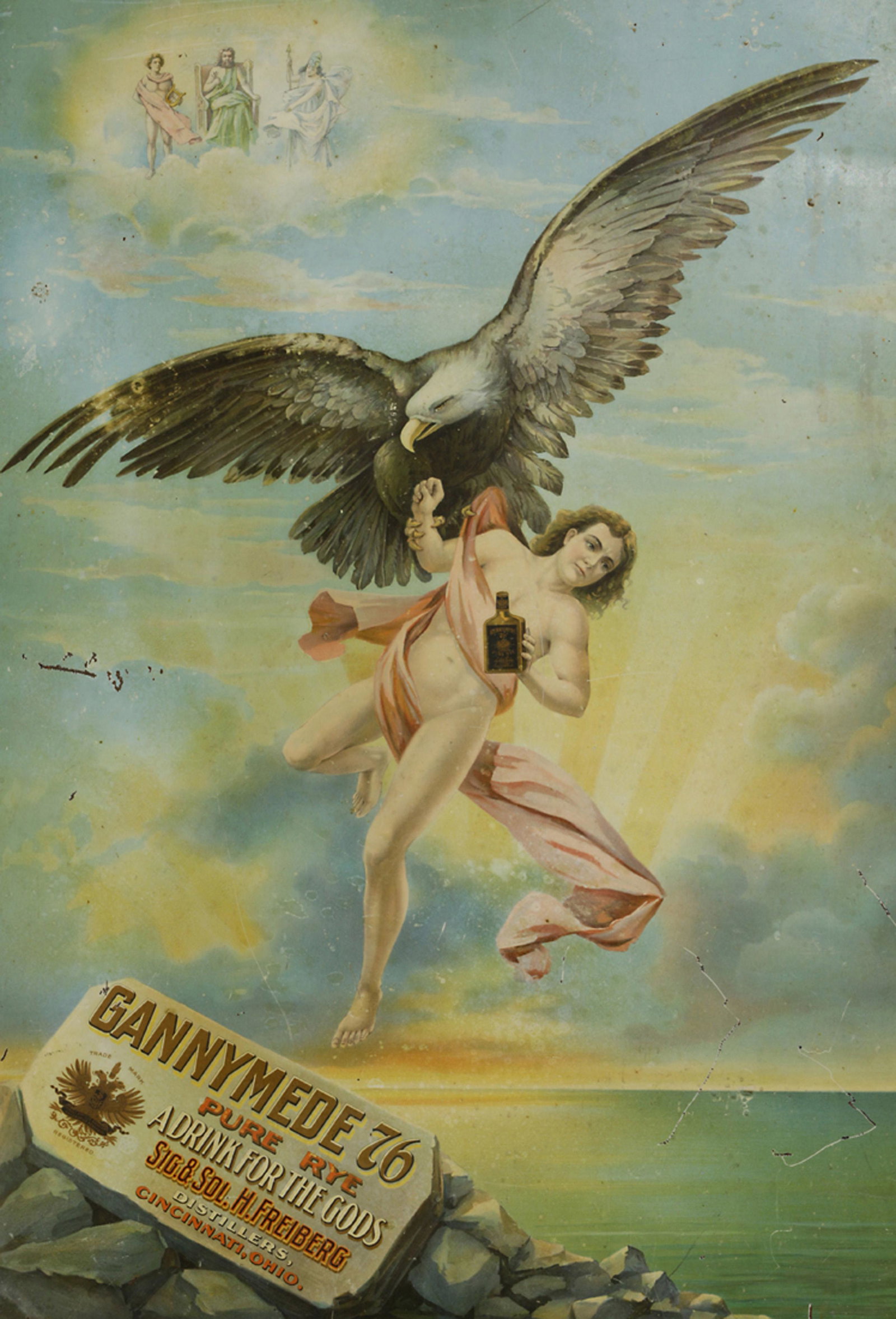 A Cincinnati distillery sign for Gannymede 76 Pure Rye: A Cincinnati distillery sign for Gannymede 76 Pure Rye, "A Drink for the Gods", circa 1890, depicting an eagle male nude and executed by Meek & Beach Co.-Coshocton, O., 34"h x 24"w