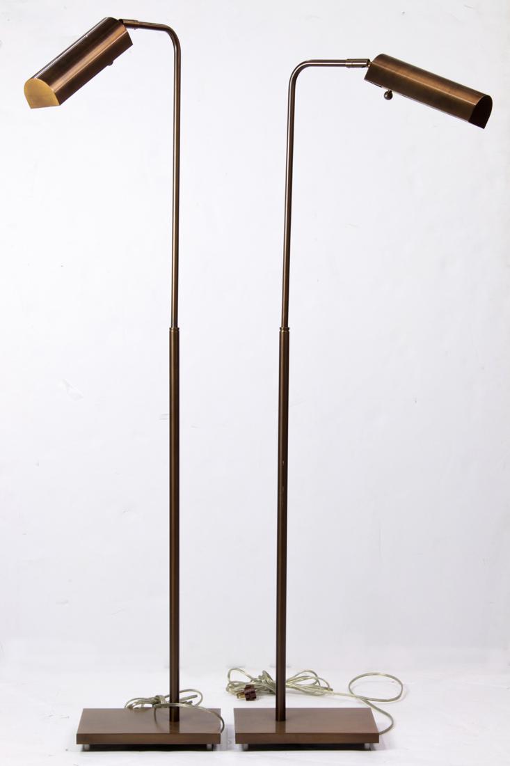 A pair of Contemporary brass adjustable floor lamps: Pair of Contemporary brass adjustable floor lamps, in the manner of Cedric Hartman, 49"h