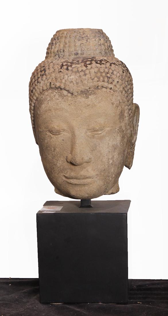 Thai / Chinese style sandstone head: Southeast Asian sand stone Buddhist head, carved from red stone, the head with a top knot hair, downcast eyes and elongated lobes 17"h with stand