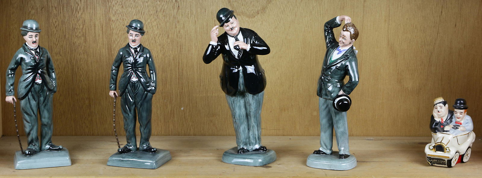 (lot of 5) Four Royal Doulton figures (1 of 1)