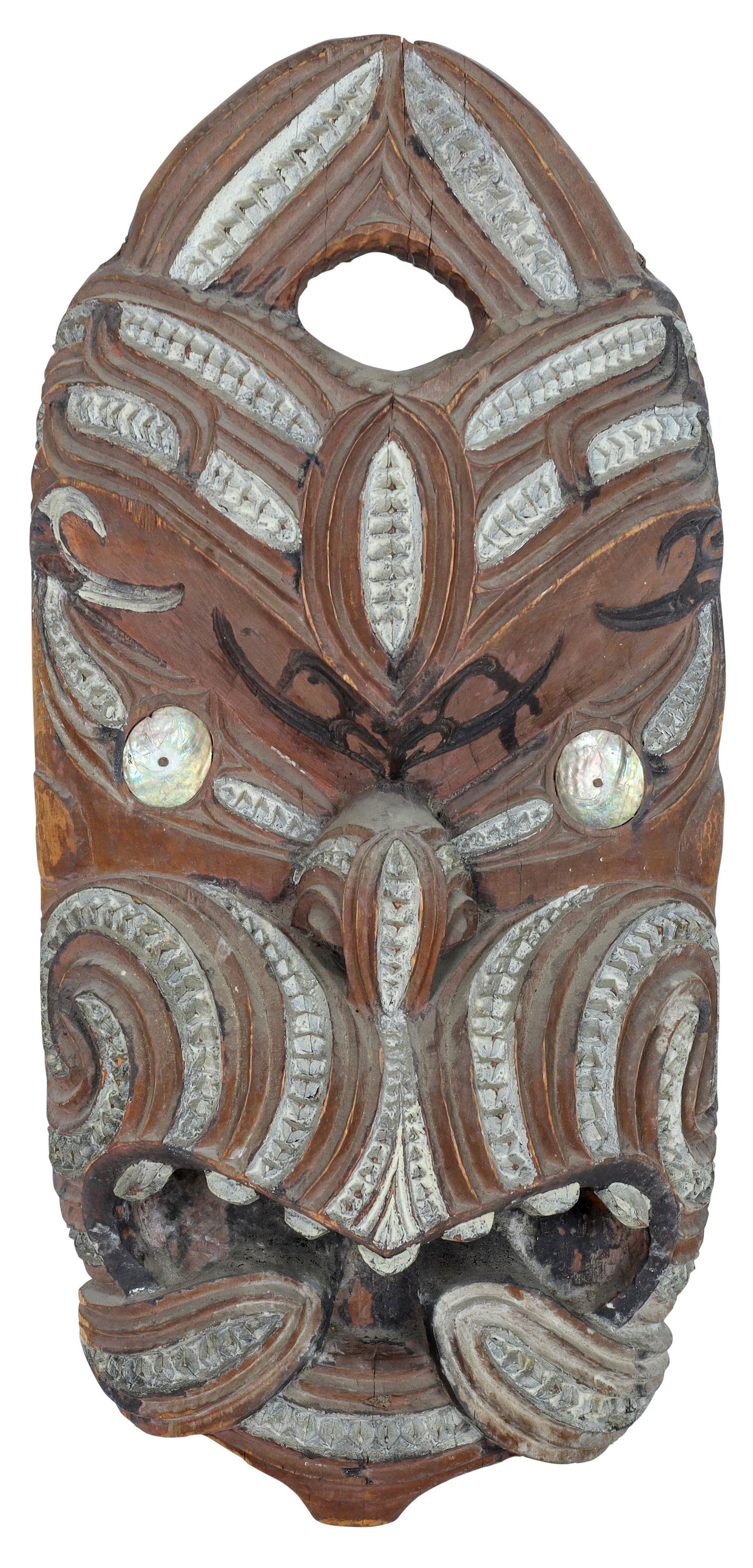 Modern Maori carved head, having circular shell eye (1 of 3)
