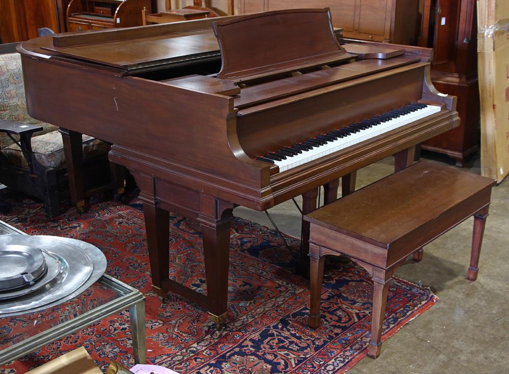Steinway and Sons Duo Art reproducing baby grand piano: Steinway and Sons Duo Art reproducing baby grand piano circa 1923, serial number 232862, having a mahogany case and having an additional panel marked The Aeolian Company, New York