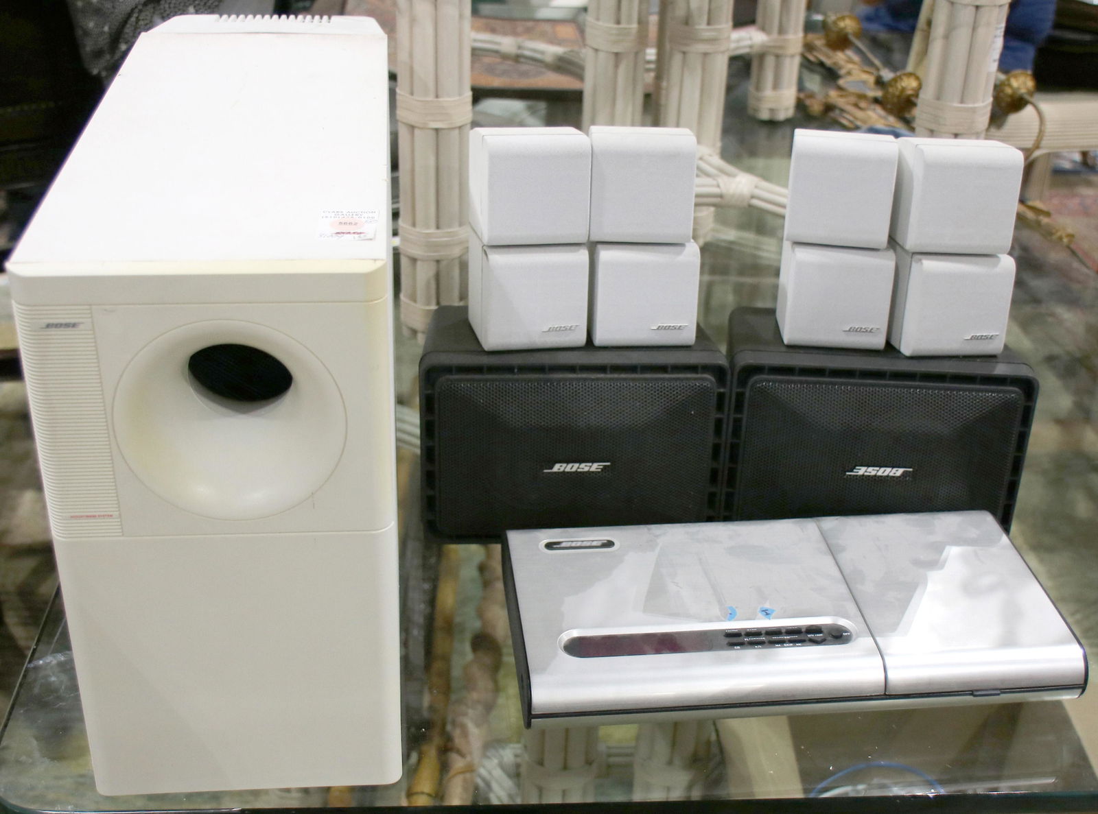 (lot of 8) Bose sound system: (lot of 8) Bose sound system, comprising a grouping of (4) speakers, (2) large speakers and central system