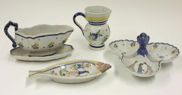 Quimper pottery condiment dish sauce: (lot of 4) Quimper table articles including a divided trefoil form condiment dish, fish form dish, jug 5.75'', and a sauce boat, decorated with floral patterns and Breton people, all signed Henriot Qu