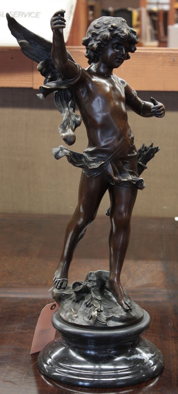 Bronze sculpture of Cupid: Bronze sculpture of Cupid with outstretched wings, on a round black marble base,after and signed ''Aug Moreau,'' 28''h