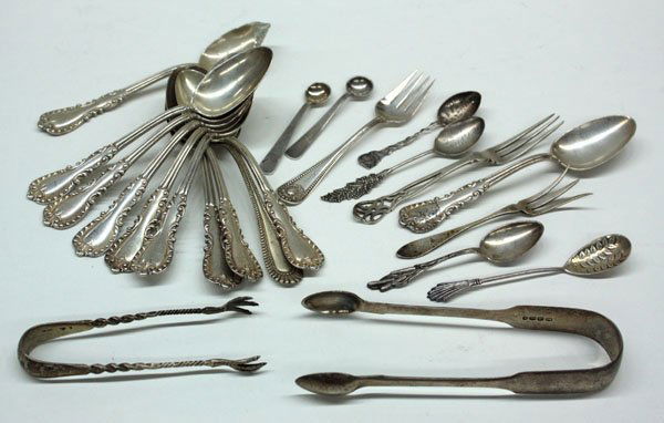 Sterling silver flatware: Sterling silver flatware grouping including ten Reed & Barton Majestic pattern teaspoons retailed by W.K. Vanderslice and engraved 'TLM,' a pair of 1831 London sterling ice tongs, a pair of Whiting su