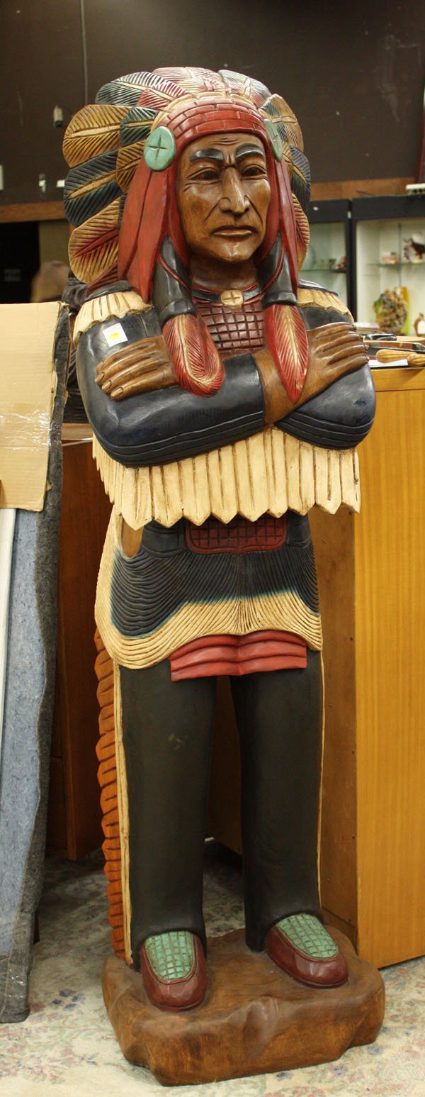 Wooden Indian with arms folded