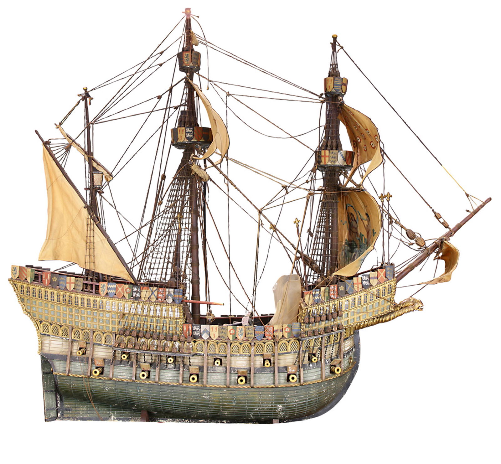A Spanish galleon ships model: A Spanish galleon ships model, the large full rigged form with hand painted sails, crows nests, and a polychrome decorated main deck and gun decks, 63"h x 77"w
