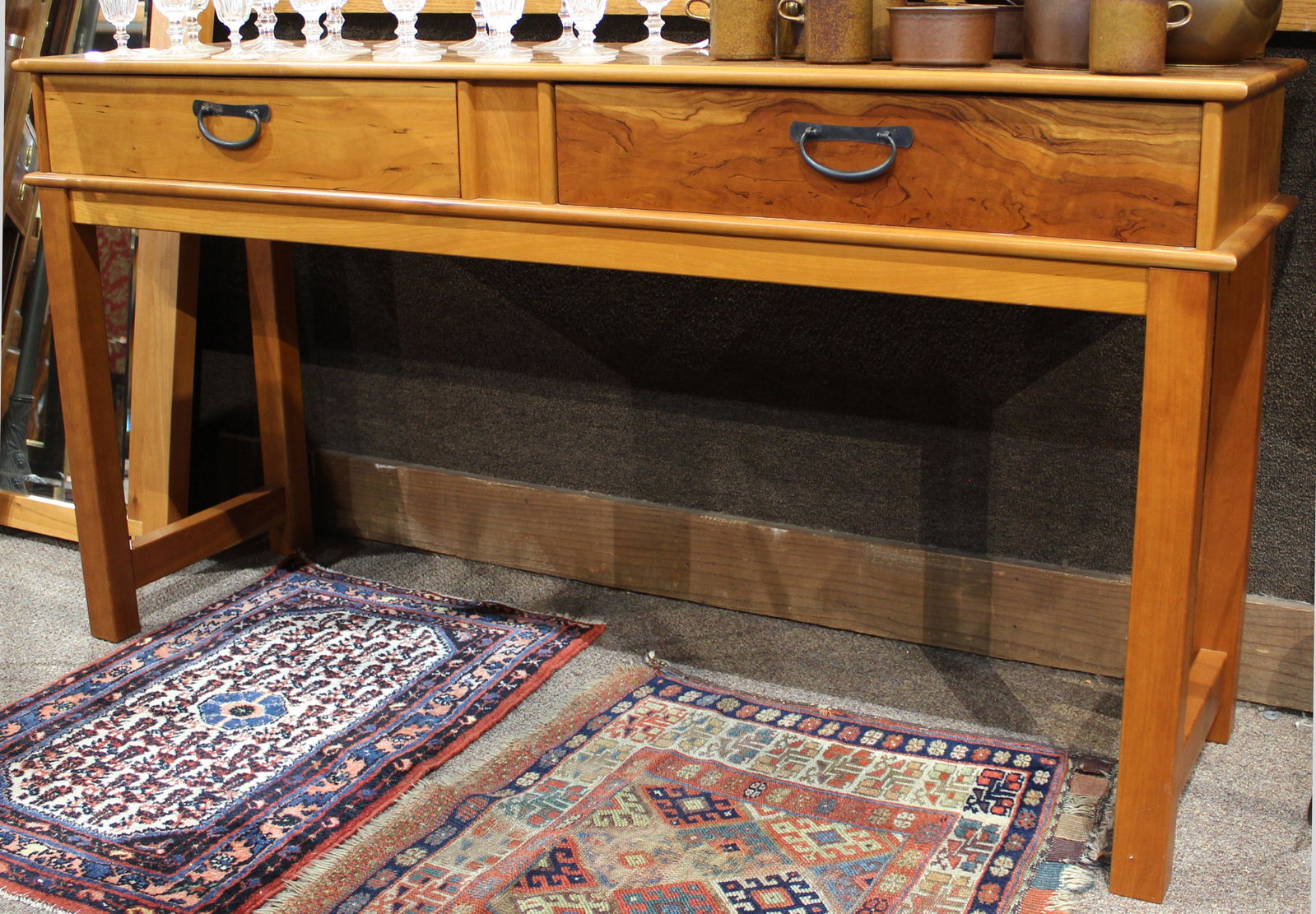 A Berkeley Mills custom sideboard in the Japanese taste: A Berkeley Mills custom sideboard in the Japanese taste, executed in cherry, having two drawers and rising on square legs, overall 30"h x 57"w x 16"d