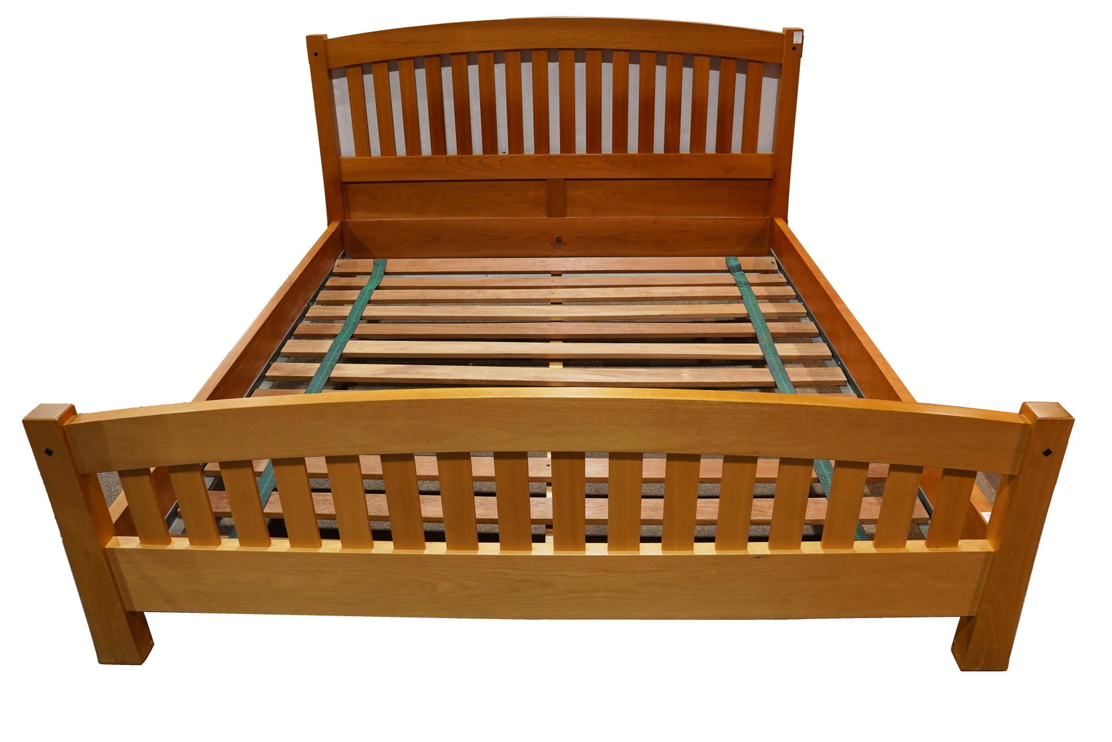An Arts and Crafts style Berkeley Mills king bed: Arts and Crafts style Berkeley Mills king bed, having a slatted head board and foot board, 43.5"h