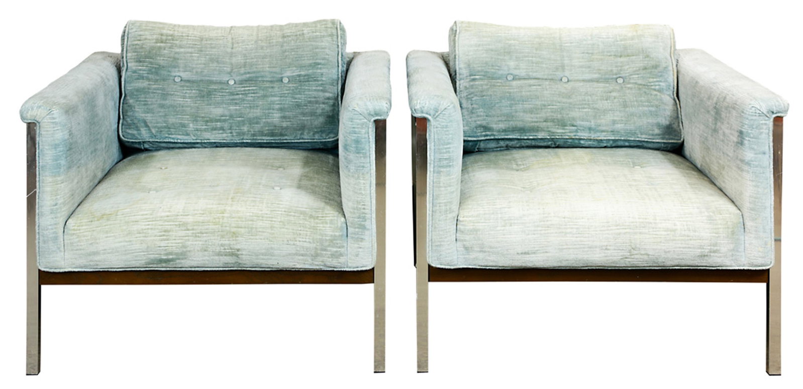A pair of Milo Baughman lounge chairs: A pair of Milo Baughman lounge chairs, each executed in sky blue upholstery with a tufted back, above a chrome frame, 23"h x 31"w x 31"d