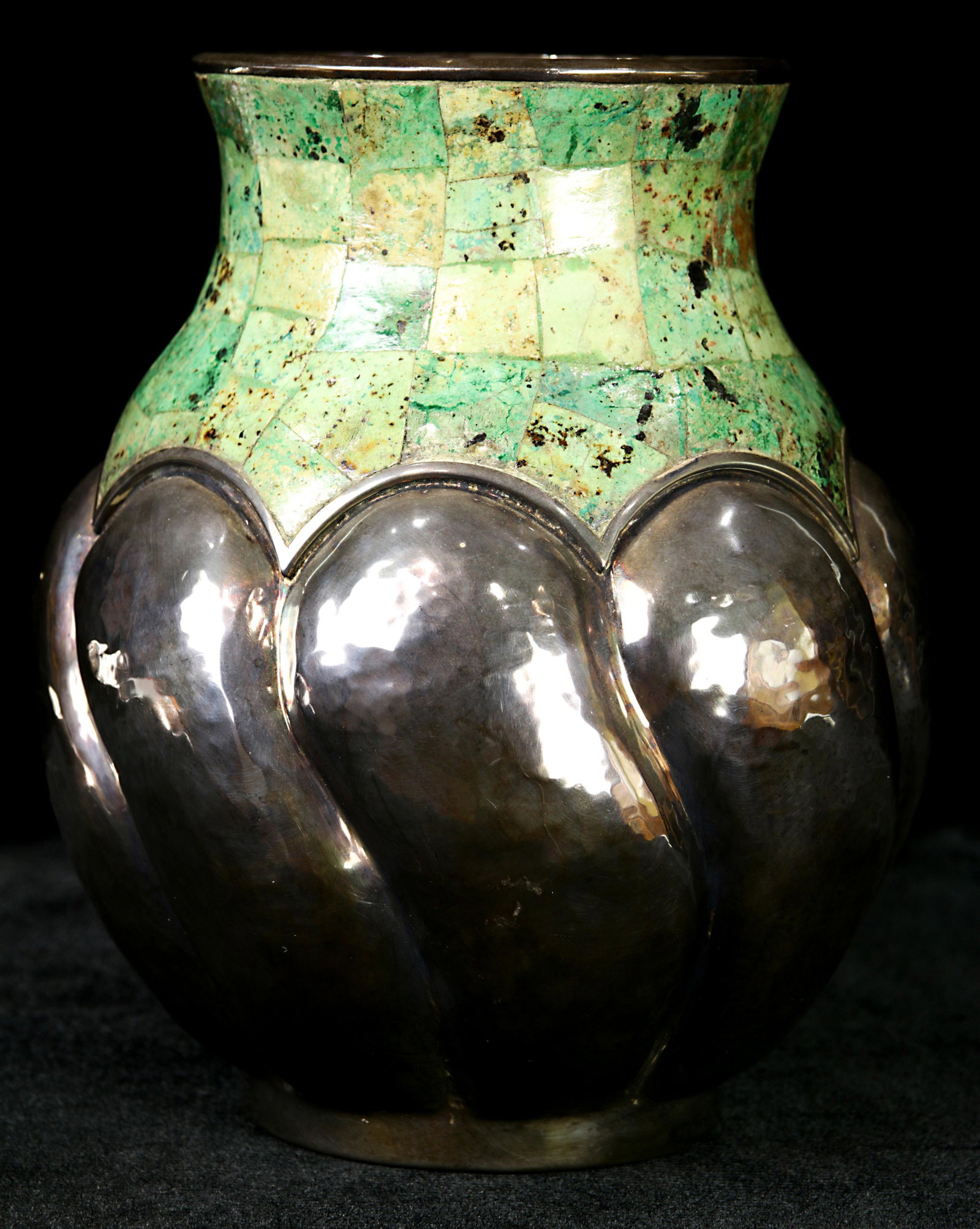 A Los Castillos turquoise veneered silver plated: A Los Castillos turquoise veneered silver plated vase, the footed ovoid form cast with a twisting petal form border, marked "Plateado", 7.5"h