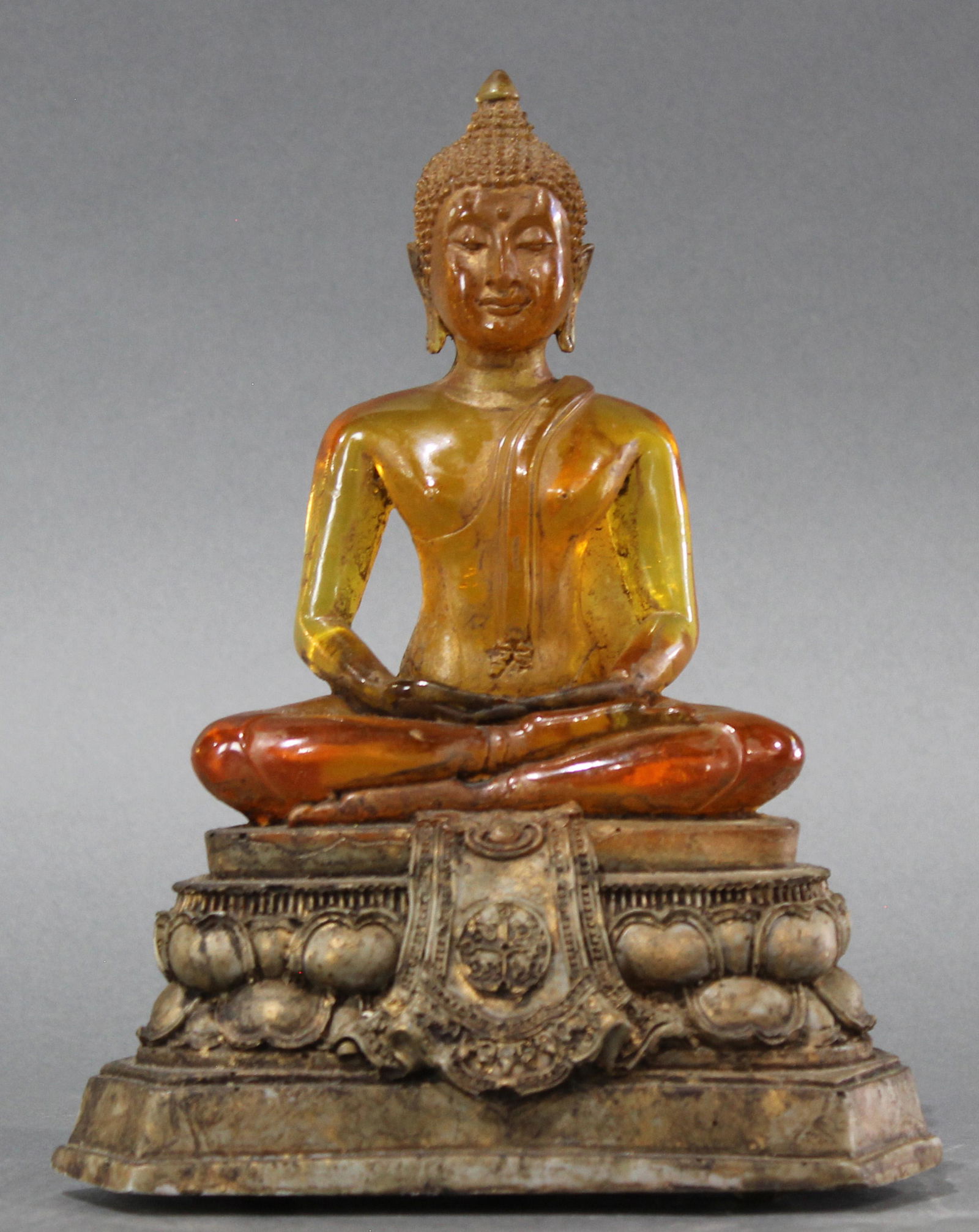 Asian sculpture of a Seated Buddha fabricated of amber (1 of 1)