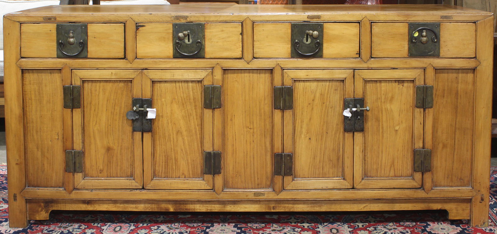 A Chinese elmwood sideboard cabinet (1 of 3)