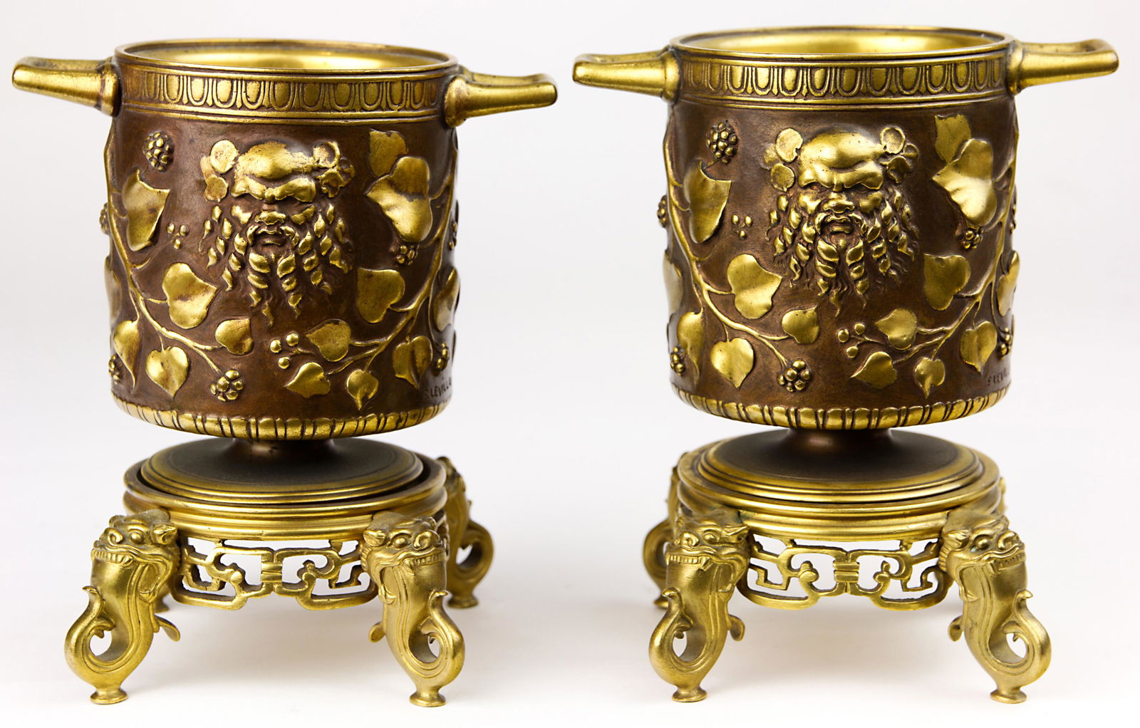 A pair of Grand Tour style gilt and patinated urns on (1 of 8)