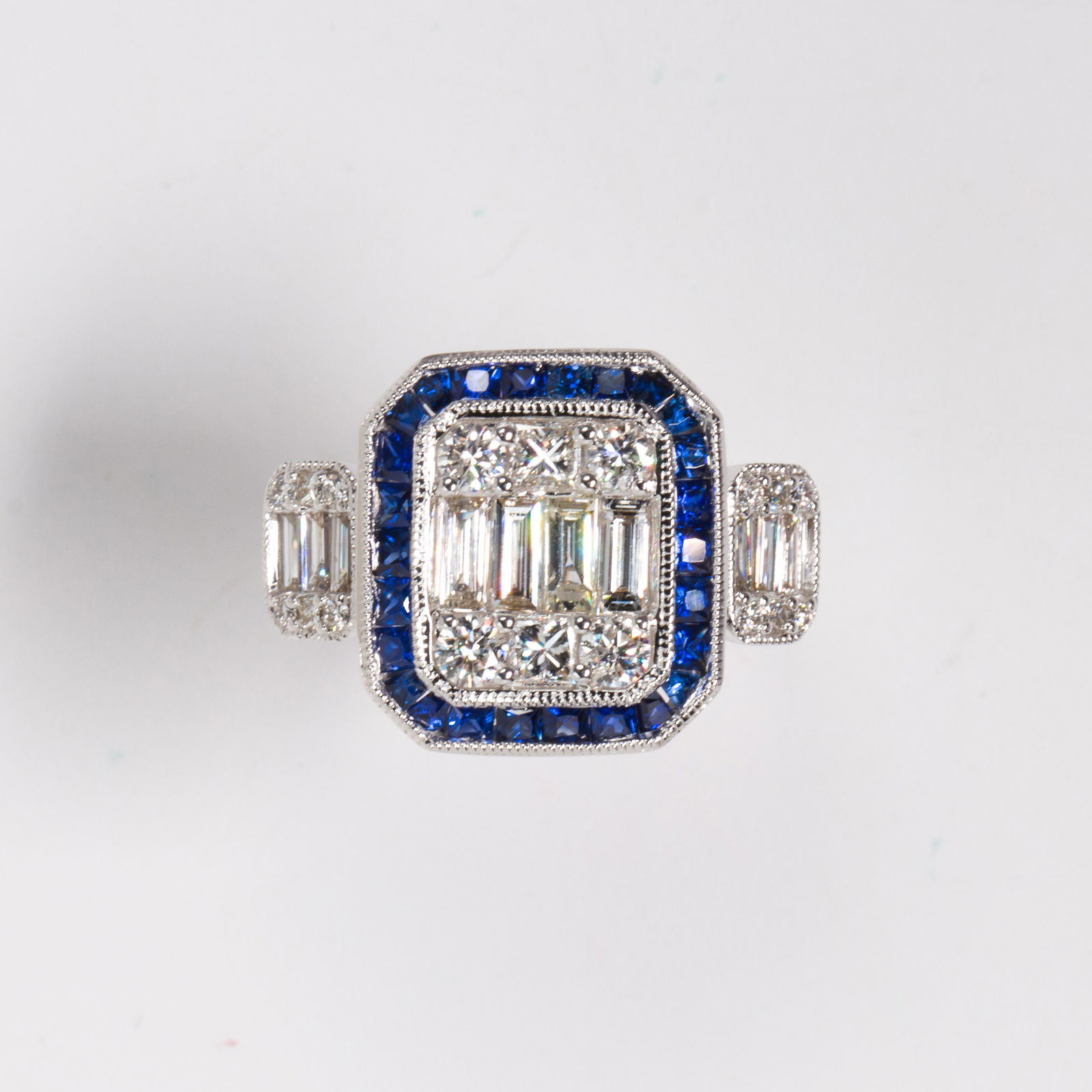 A sapphire, diamond and eighteen karat white gold ring (1 of 2)
