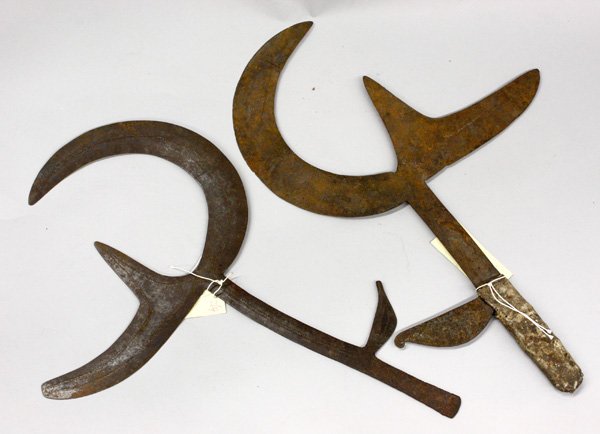 Throwing knives, Congo: (lot of 2) Throwing knives, Azande, D. R. Congo, one with leather handle, 20''h x 13''w