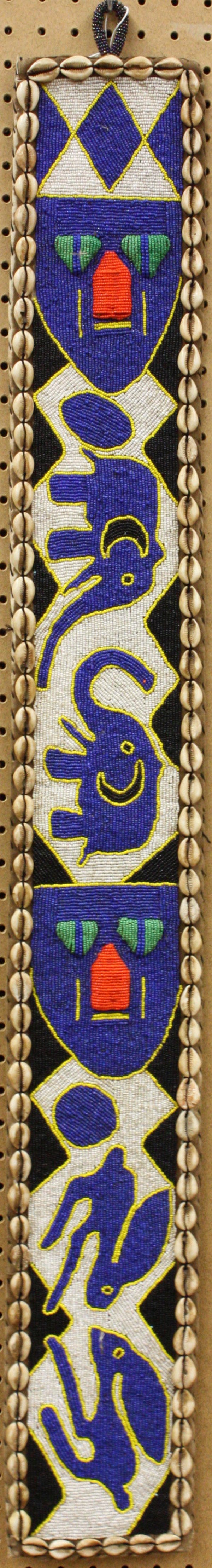 Beaded ceremonial sash Yoruba Nigeria: (lot of 2) Beaded ceremonial sashes, Yoruba tribe, Nigeria, with elephant and mask decoration and cowrie shells, the larger 45''l x 6''w