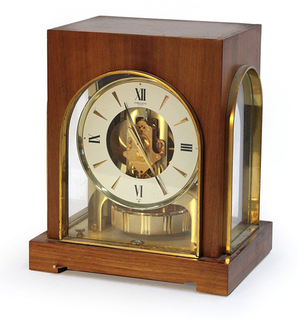 Gruen Guild Atmos clock: Gruen Guild Atmos clock with brass mounted matchbook walnut veneered case, 10''h x 8.5''w x 6.5''d