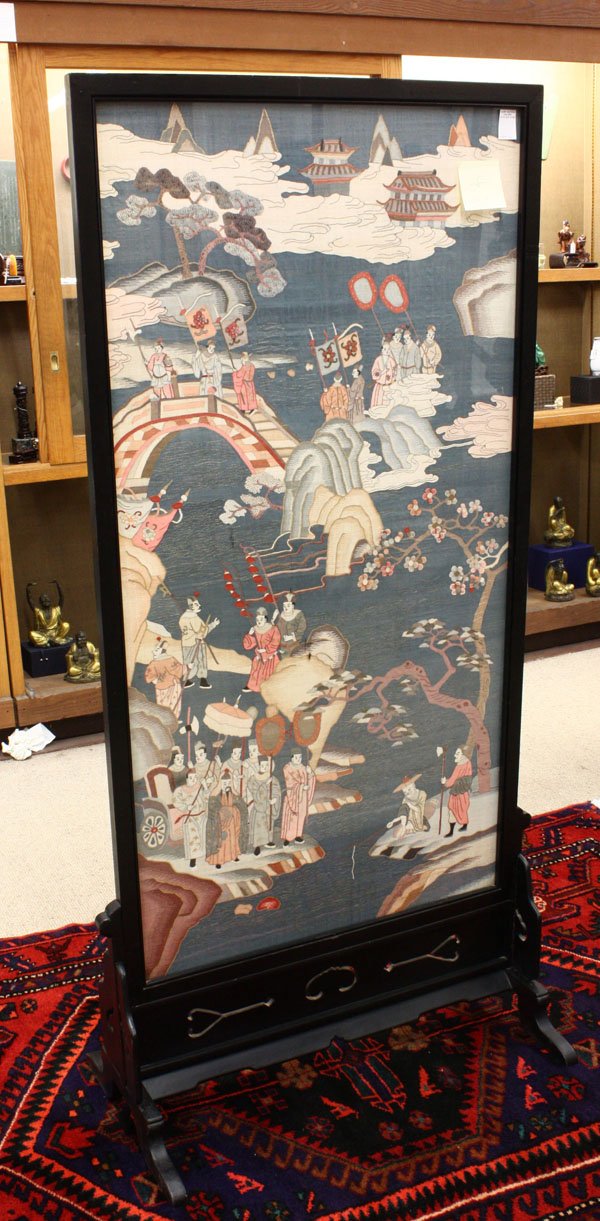 Chinese Kesi Tapestry Panel Screen: Chinese kesi textile panel mounted as a free-standing screen, depicting immortals in an imaginary landscape with blossoming trees and palaces partially hidden in bands of scrolling clouds, the multi-c