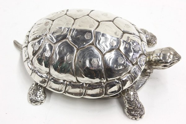 Italian sterling silver turtle box: Italian sterling silver covered turtle dish, the textured shell as a detachable lid, the realistically rendered turtle limbs splayed from the body, the box base as the turtle belly lying flush to surf