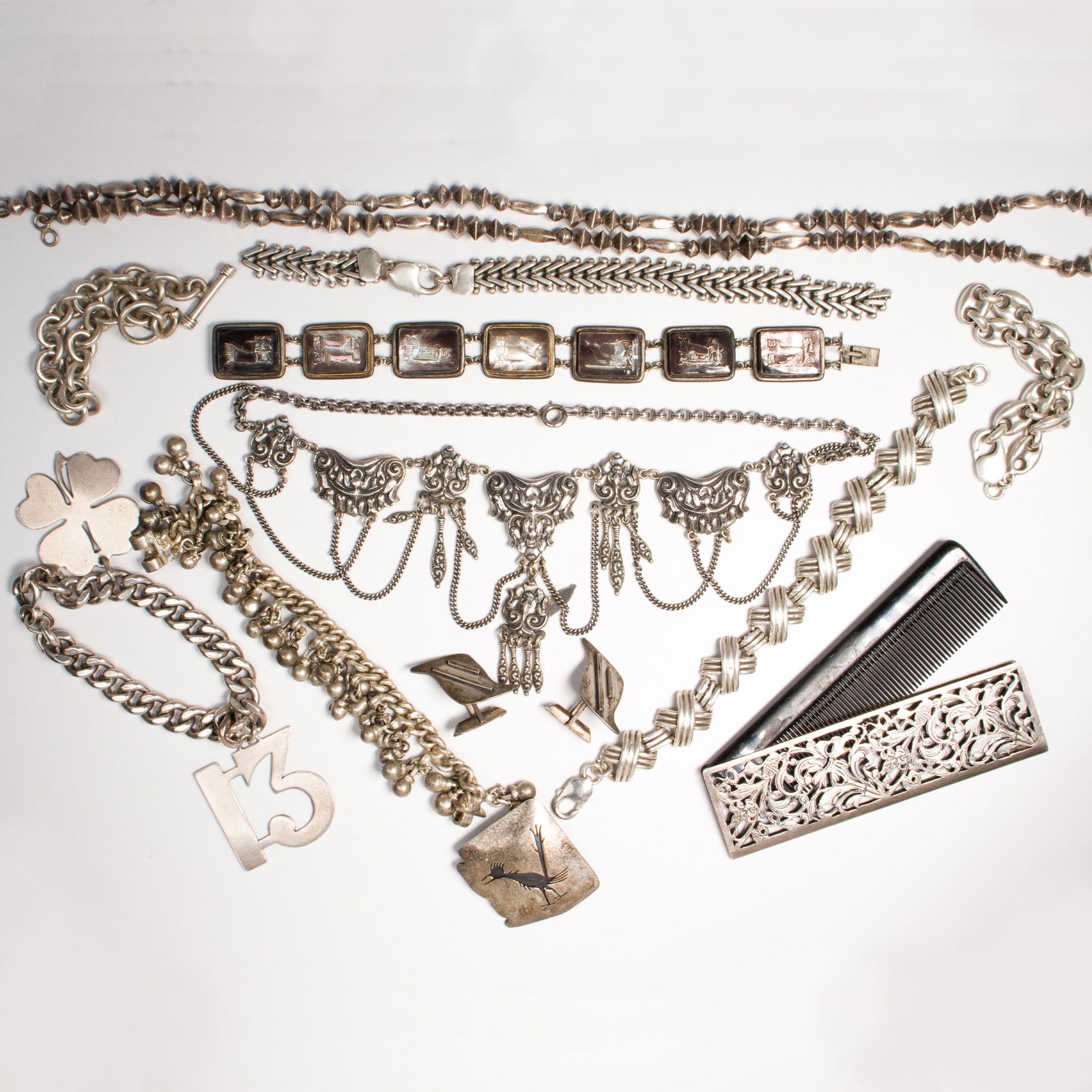 A group of silver jewelry and accessories (1 of 1)