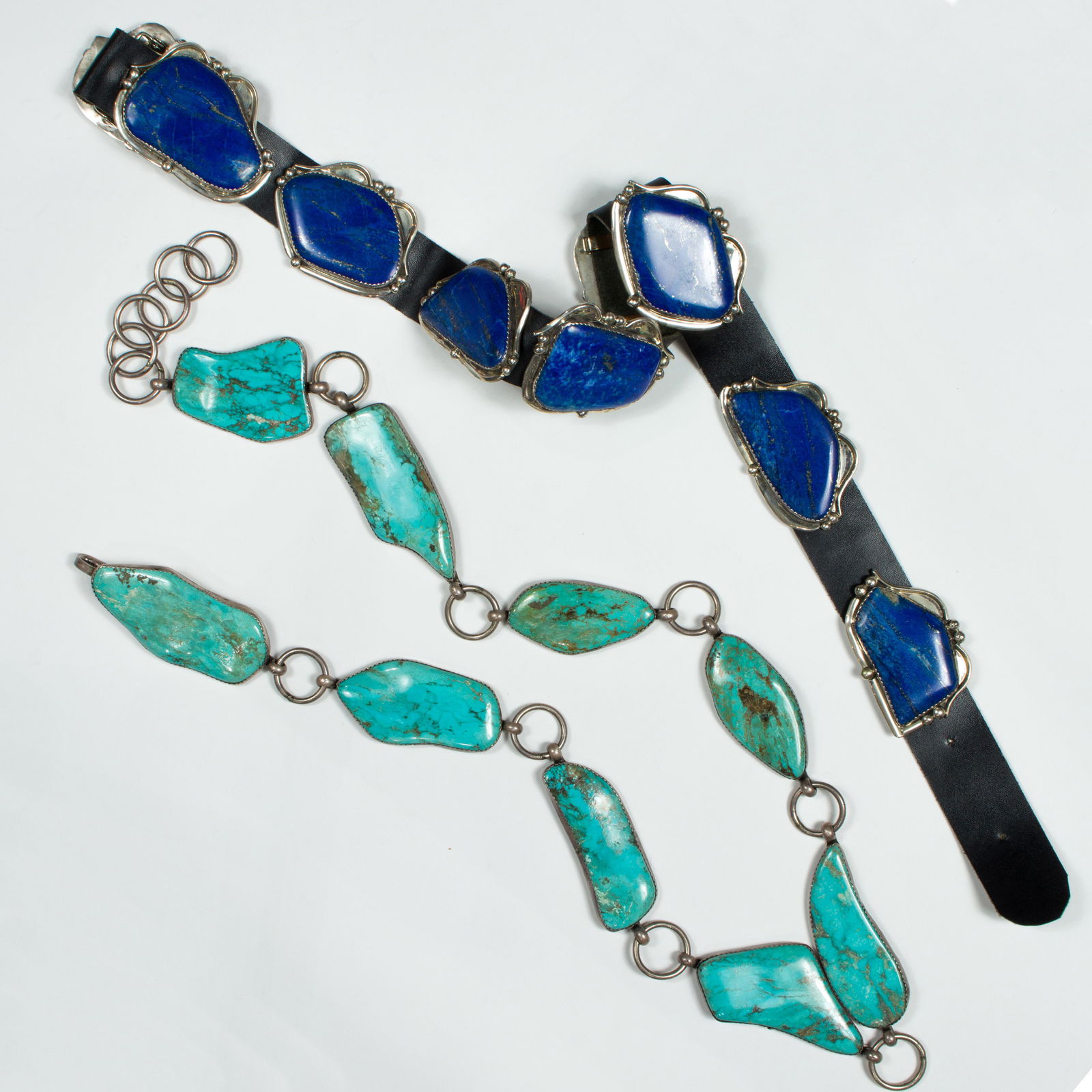 A group of turquoise or lapis and silver belts (1 of 1)