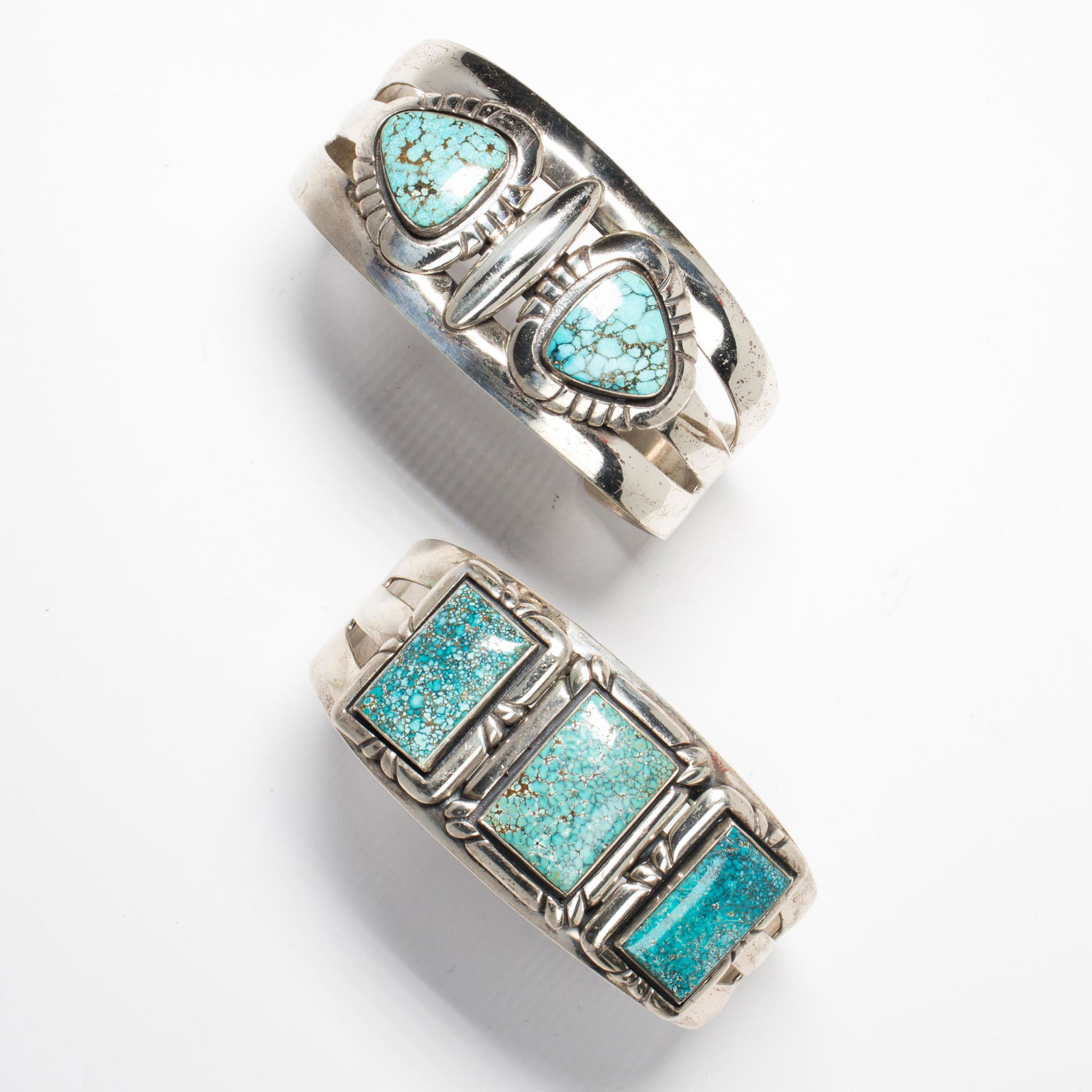 A group of turquoise and silver bracelets (1 of 1)
