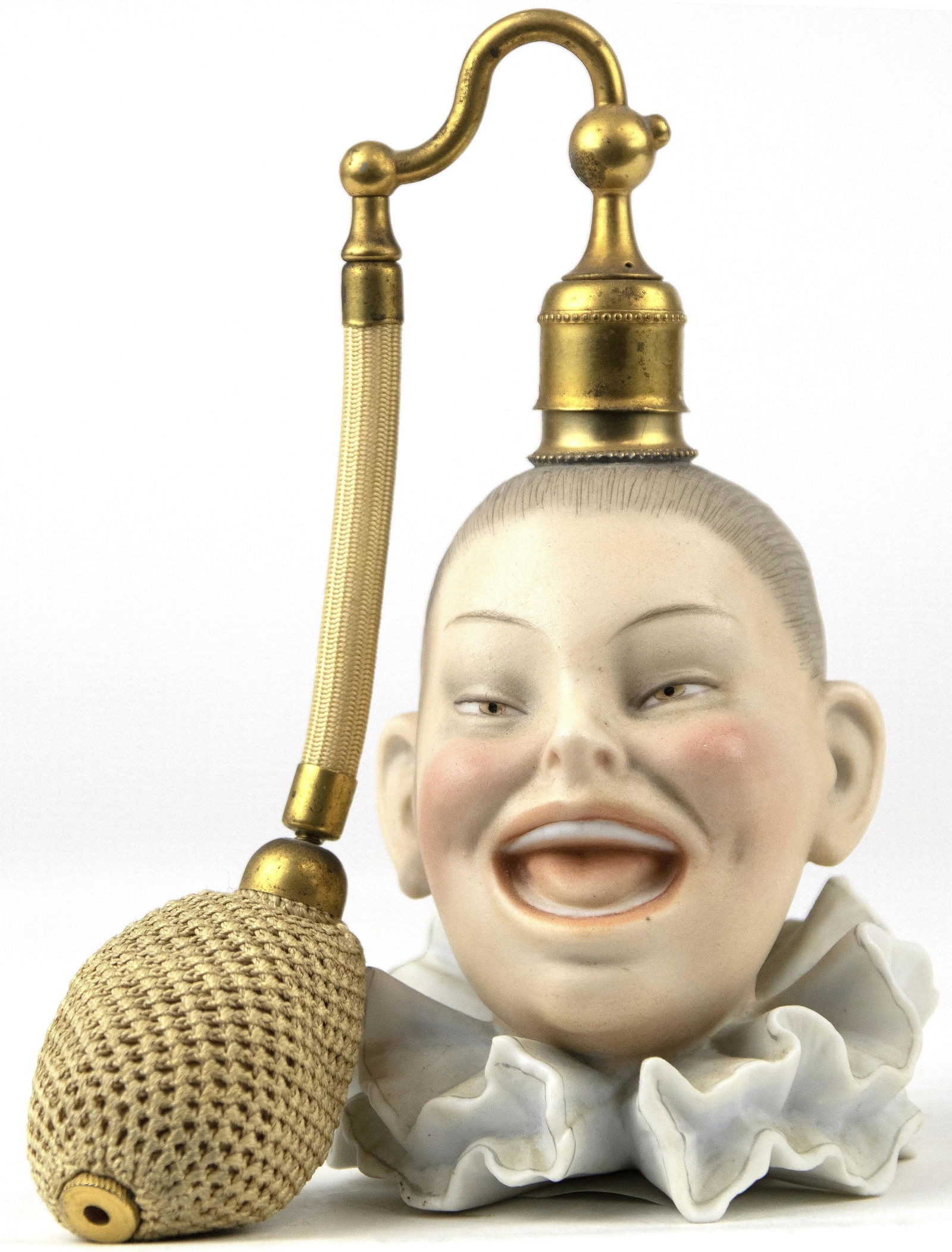 A Continental porcelain bisque figural perfume bottle (1 of 2)
