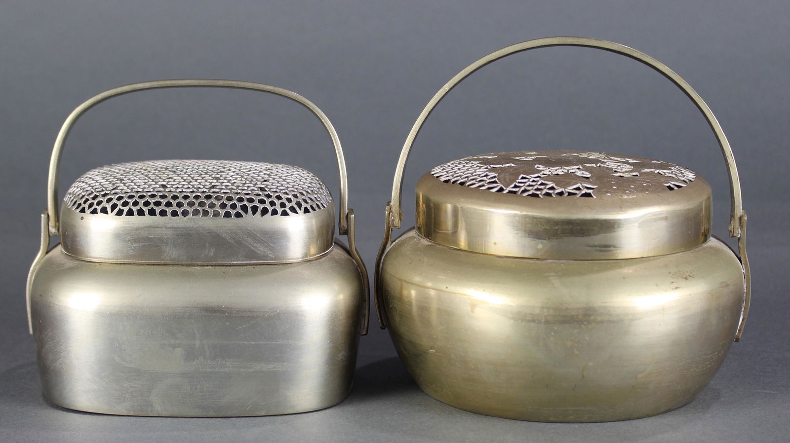 (lot of 2) Chinese white or gold metal hand warmers (1 of 3)
