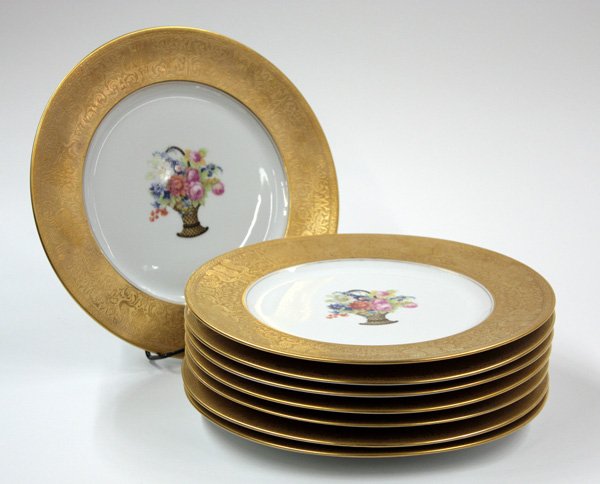 Heinrich & Co Bavarian cabinet plates: Set of eight Heinrich & Co Bavarian cabinet plates centered with flower basket transfer with classical motif gilt band, 10.5''d