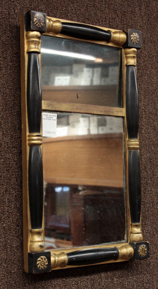Sheraton ebonized partial gilt mirror: Sheraton ebonized and partial gilt small mirror, circa 1825, two panels, split pilasters with rosette corners, 19''h x 11.5
