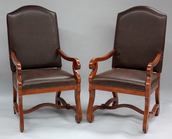 Empire style mahogany arm chairs: Pair of Empire style mahogany framed open arm chairs upholstered in brown leather with brass nailhead trim, 46''h x 26''w x 26''d