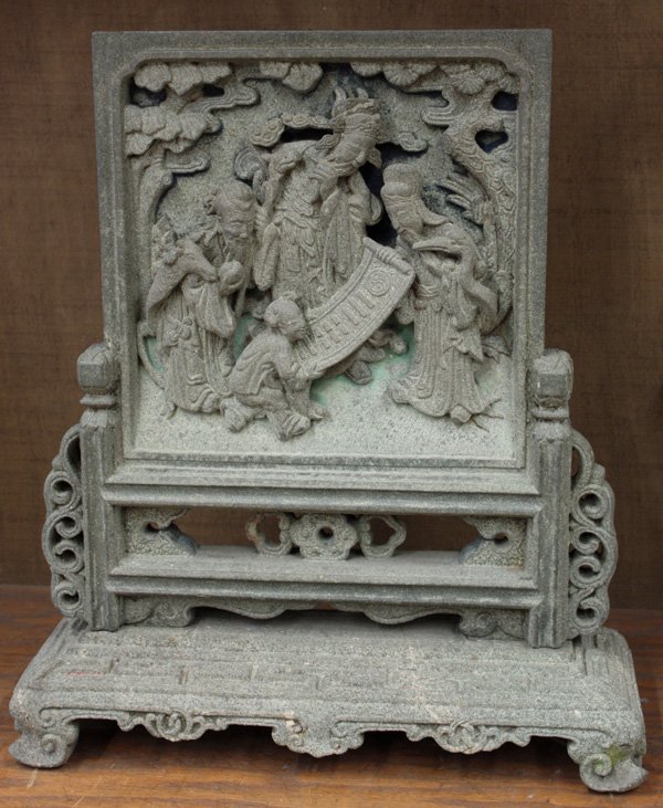 Chinese Green Stone Table Screen: Chinese green limestone two-section table screen, the upper panel well carved and undercut with an attendant and three immortals gazing at an Yi-jing scroll on a garden terrace, the reverse with the c