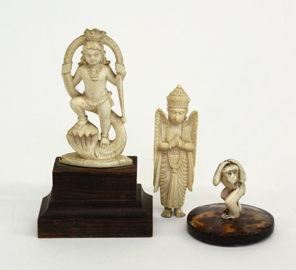 Japanese Ivory/Hindu Ivory Deities: (lot of 3) Japanese and East Indian ivory carvings, the first a small monkey supported on a circular tortoise shell base, the next depicting Krisna subduing the Naga-king (with a wooden base), the las