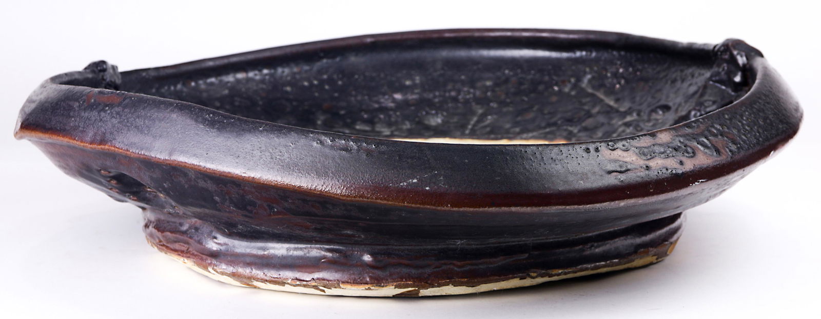 A clay funk circular glazed and incised stoneware (1 of 3)