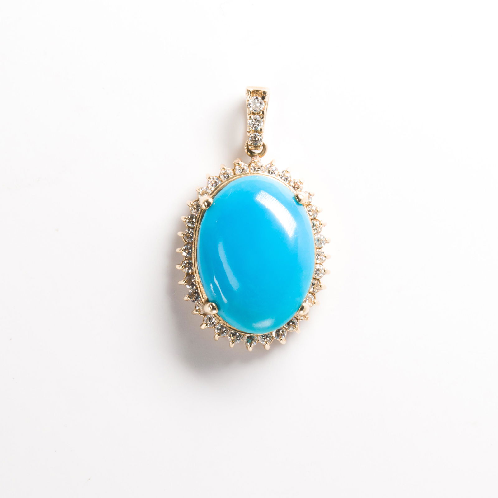 A turquoise, diamond and fourteen karat gold pendant (1 of 1)