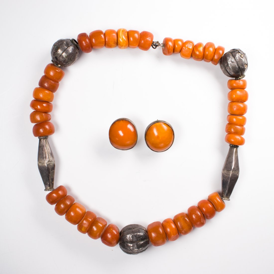 An amber and silver bead necklace and pair of earclips (1 of 2)