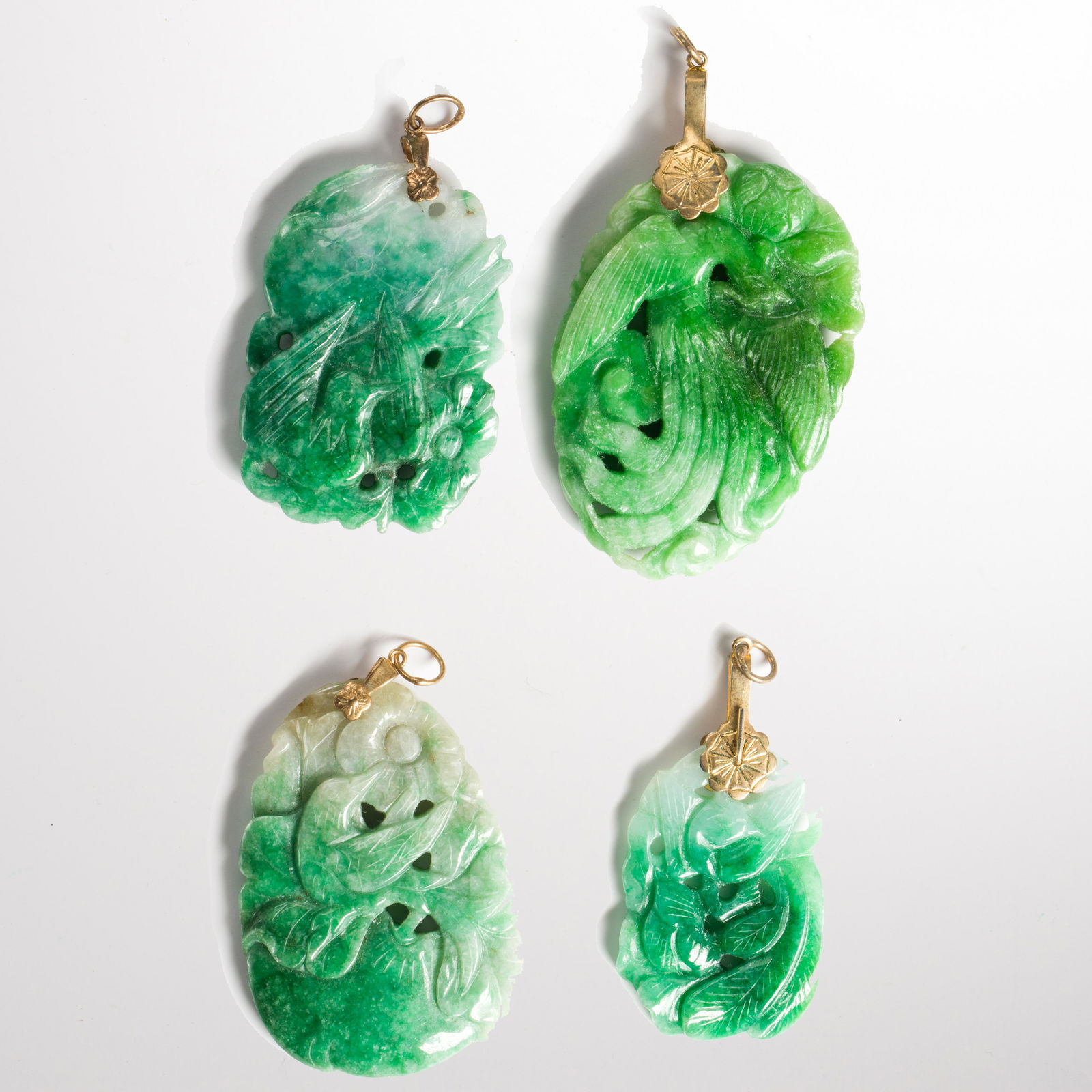 A group of four jade pendants (1 of 1)