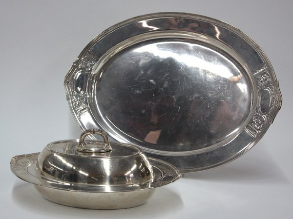 Gorham sterling silver hollowware serving set: (lot of 2) Gorham sterling silver hollowware serving set in the St. Dunstan pattern, made 1929 and monogrammed 'MAE,' including covered vegetable dish, 12''w, and oval serving platter, 16''w, 52 troy 