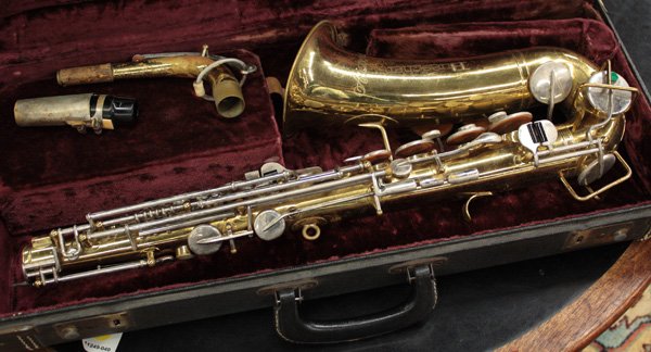 Cased Buescher Aristocrat vintage alto saxophone: Cased Buescher Aristocrat vintage alto saxophone, case 24''w x 10''d