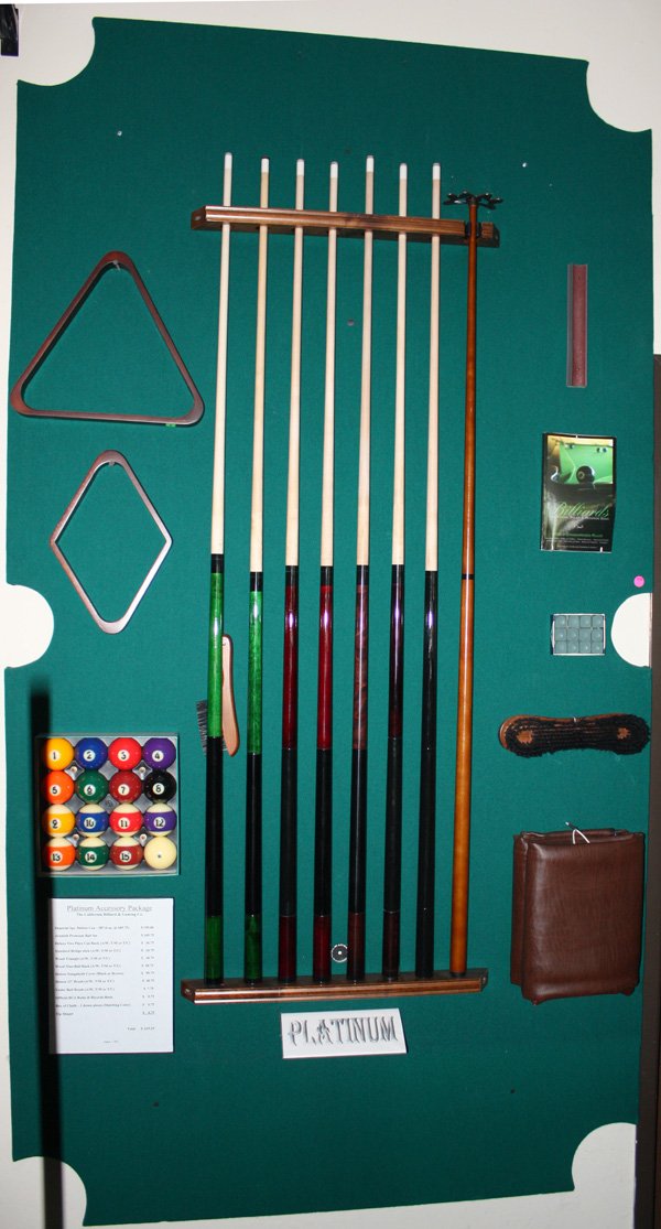 Pool table accessories Aramith balls: "Platinum" pool table accessory package including seven cues in various sizes, two piece cue rack, Aramith premium ball set, standard bridge stick, wood triangle, wood nine-ball rack, brown naugahyde