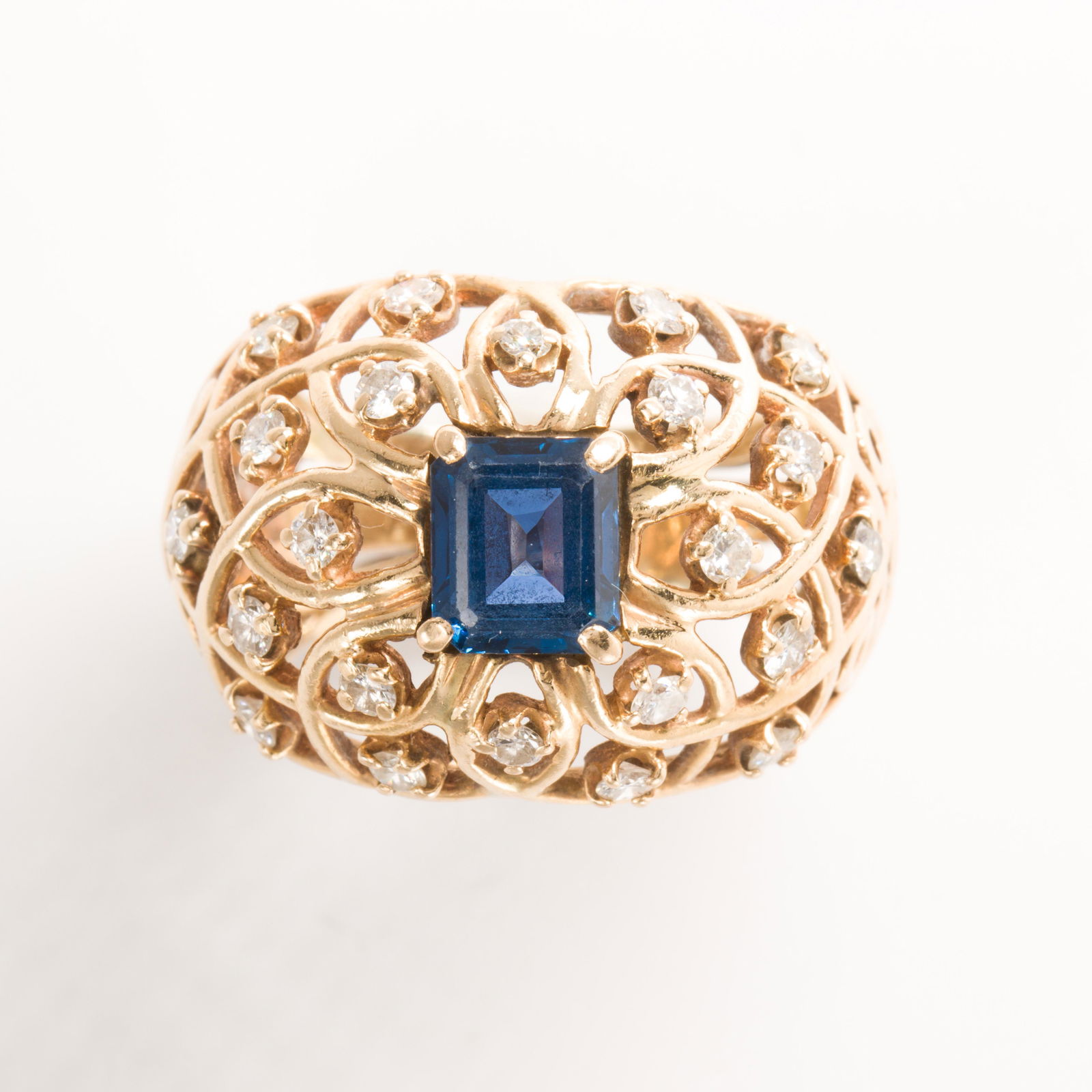 A sapphire, diamond and fourteen karat gold ring (1 of 2)